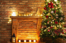 Beautiful Decorated Fireplace, Wooden Mantelpiece With Fairy Lights, Handmade Ornaments, Candles And Lantern, Christmas Tree To The Side, Selective Focus