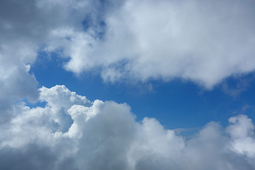 Wall Mural - fluffy white cloud moving above dream sky background