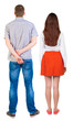 © ghoststone - Back view of couple. beautiful friendly girl and guy together.