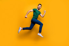 Full Size Photo Of Cheerful Guy Jump Run Fast For Discounts Wear Modern Clothing Isolated Over Yellow Color Background