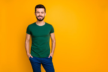 Canvas Print - Portrait of cheerful guy have spring holidays put hands pockets wear casual style clothes isolated over yellow color background