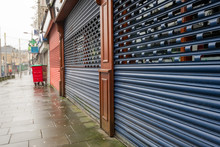 High Street Shops Closing Down With Shutters Closed, Decline In Shopping In Wales, United Kingdom