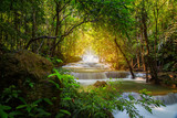 Fototapeta Łazienka - Beautiful waterfall nature scenery of colorful deep forest in summer day