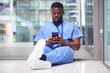 © Monkey Business - Male Medical Worker In Hospital Addicted To Using Mobile Phone At Work