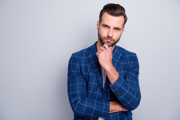 Canvas Print - Photo of bewildered puzzled man listening to you attentively touching bearded chin standing confidently isolated over grey color background