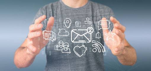 Businessman holding a cloud of social media network icon