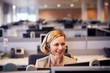 © Monkey Business - Mature Businesswoman Wearing Telephone Headset Talking To Caller In Customer Services Department