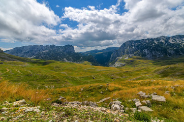 Poster - Summer mountaine landscape with cloudy sky. Mountain scenery, National park Durmitor, Zabljak, Montenegro