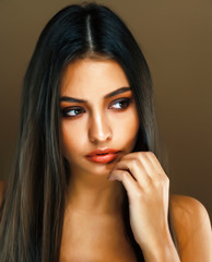 Wall Mural - cute happy young indian woman in studio closeup smiling, fashion beauty