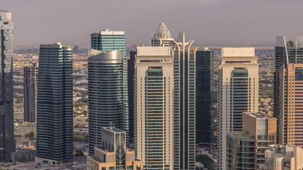  Dubai Marina skyscrapers and jumeirah lake towers view from the top aerial timelapse in the United Arab Emirates.
