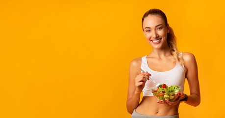 Sticker - Fit Girl Eating Veggie Salad Standing Over Yellow Background, Panorama