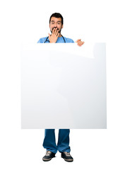 Wall Mural - Surgeon doctor man holding an empty placard