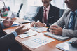 © amnaj - New generation of businessmen have new partners business ideas on business investment.