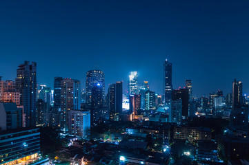 Bangkok night view with skyscraper in business district in Bangkok Thailand