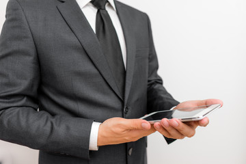 Aufkleber - Male human wear formal work suit hold smart hi tech smartphone use hands