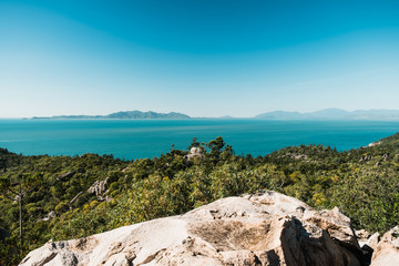 Wall Mural - Pristine nature in Magnetic island, Australia, beautiful view on the ocean and green tropical forest below