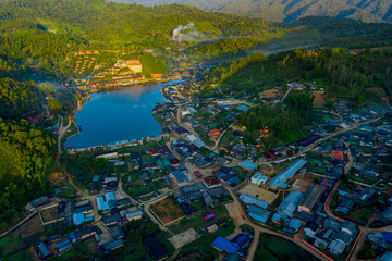 Aerial landscape of Ban Rak Thai with sunrise in the morning located in Maehongsan province, Thailand.