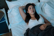 © PR Image Factory - Thoughtful asian chinese millennial girl lying in white comfortable bed lost in thoughts think of problem solution. pensive charming woman relaxing in bedroom suffer from insomnia sleep deprivation