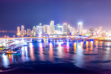 Aerial Miami skyline night long exposure in Miami Beach and MacArthur Causeway