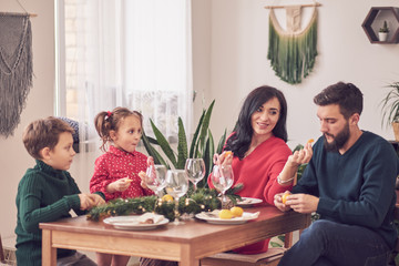 Family Together Christmas Celebration Concept. Family Enjoying christmas dinner background