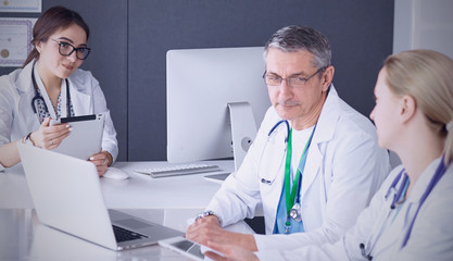 Wall Mural - Doctors having a medical discussion in a meeting room