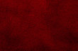 Red leather texture background, faux leather pattern. 