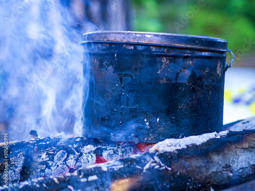 Fotografía Bowler Sasha at the stake, Cooking food at the stake outdoors scene