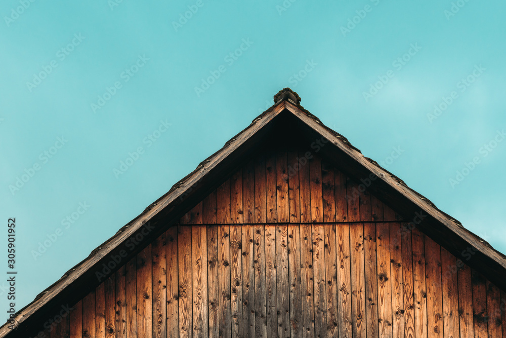 Gable shed roof and blue sky - obrazy, fototapety, plakaty 