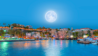 Wall Mural - Old town (Kaleici)  at dusk with full moon- Antalya, Turkey 
