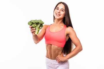 Wall Mural - Fitness woman holding broccoli isolated on white background