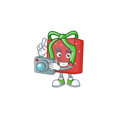 Poster - a professional Photographer red gift box cartoon character with a camera