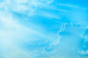 Wall Mural - Vintage tone abstract summer background, Blue sky and moving white cloud with flared light in sunny day