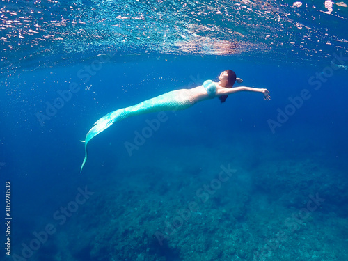 海面を泳ぐ人魚 Buy This Stock Photo And Explore Similar Images At Adobe Stock Adobe Stock