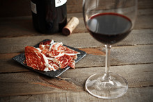  Typical Spanish Iberian Ham And Red Wine On Wood