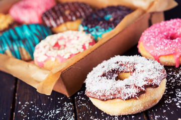 Wall Mural - Fresh homemade donuts with various toppings