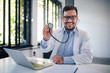 © bnenin - Portrait of a smiling doctor with stethoscope.