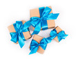 © alatielin - Gift boxes on white background. Gifts with blue bows. Gift boxes top view