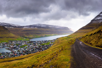 Wall Mural - City of Klaksvik with a dirt road on Faroe Islands, Denmark