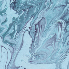  Smooth stains of liquid paint. Blue abstract texture. Marbled background