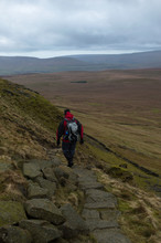 A Walker Looking Out Over Pen-y-ghent Valley In The Yorkshire Dales