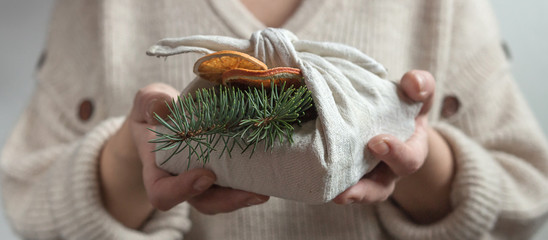 Wall Mural - zero waste, christmas eco-friendly gift wrapping in traditional japanese furoshiki style, environmen