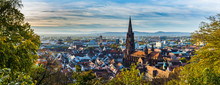 Germany, XXL Panorama Of City Freiburg Im Breisgau Skyline With Cathedral Muenster In Old Town In Warm Sunset Light In Romantic Autumn Season, Aerial View Above Cityscape