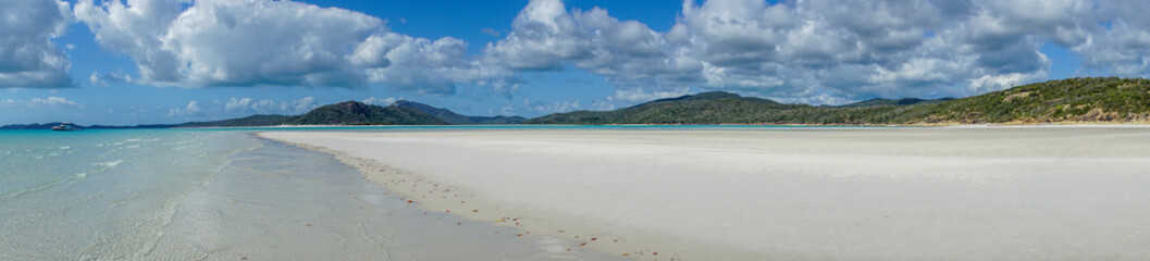 Wall Mural - the white beach of the Whitsunday Islands in Australia, which consists of 99 percent quartz sand, and the azure blue sea