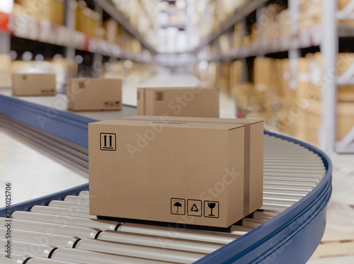 Cuadros en Lienzo Cardboard boxes on conveyor rollers ready to be shipped by courier for distribution