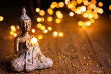 Buddha Statue With Magical Lights On Wooden Background - Religion, Buddhism