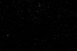 © Илья Подопригоров - WHITE BOKEH ON A BLACK BACKGROUND. LIGHT SPOTS TEXTURE. FALLING SNOW. STAR SKY.
