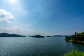 Naklejka na meble beautiful blue sky green forest mountains lake view at Kaeng Krachan National Park, Thailand.  an idea for backpacker hiking on long weekend or a couple, family holiday activity camping relaxing