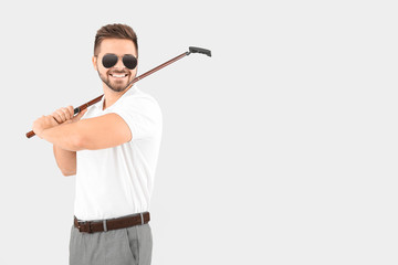 Sticker - Handsome male golfer on white background