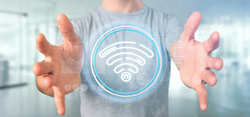 Poster - Businessman holding Wifi icon with stats and binary code 3d rendering