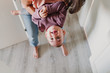 © Eva - young mother at home playing with her adorable one year old baby girl. family time